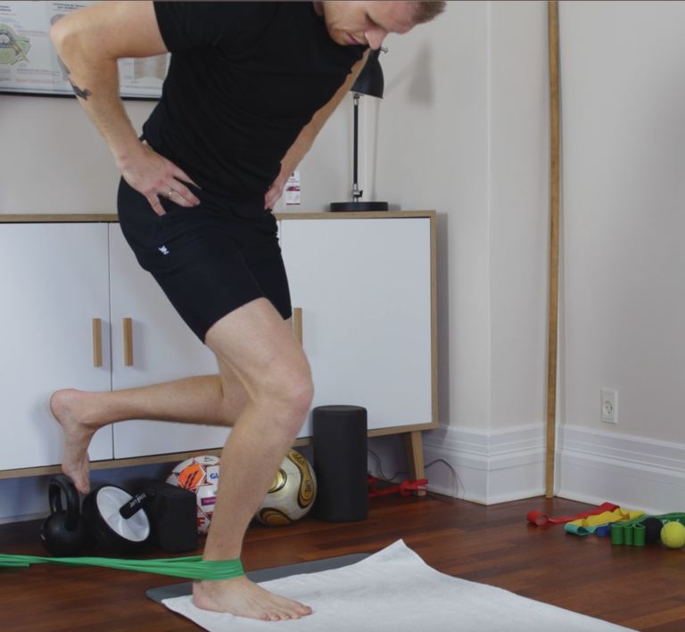 One leg squat post ankle stability w. power band